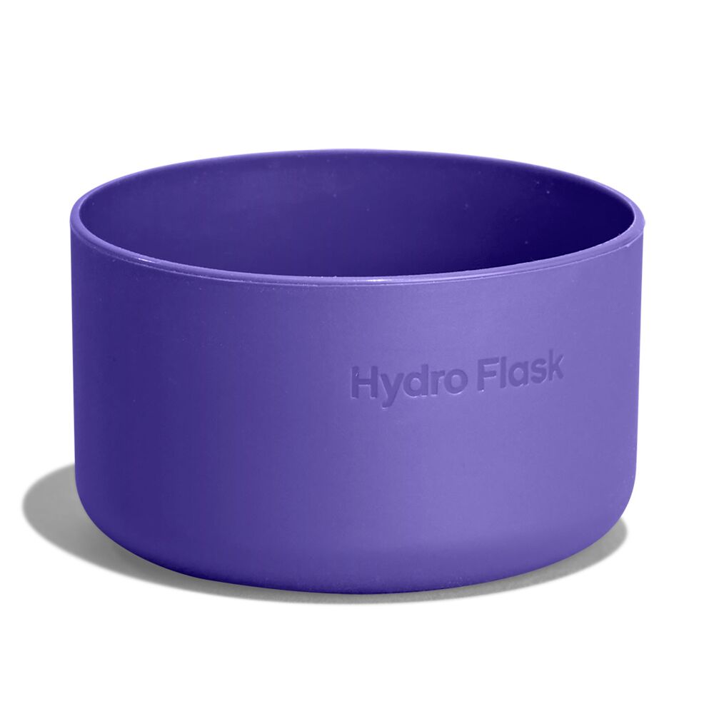 Purple Hydro Flask silicone cup or sleeve with smooth matte finish, straight sides, rounded rim, and "Hydro Flask" embossed on the exterior.
