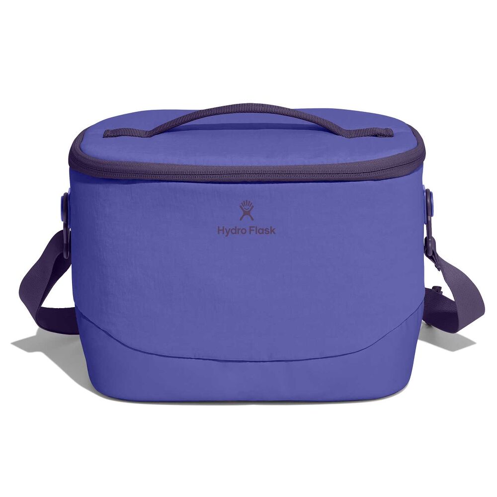 Purple Hydro Flask soft-sided cooler bag with oval zippered lid, matching top handle, detachable shoulder strap with plastic hardware, and smooth structured body.